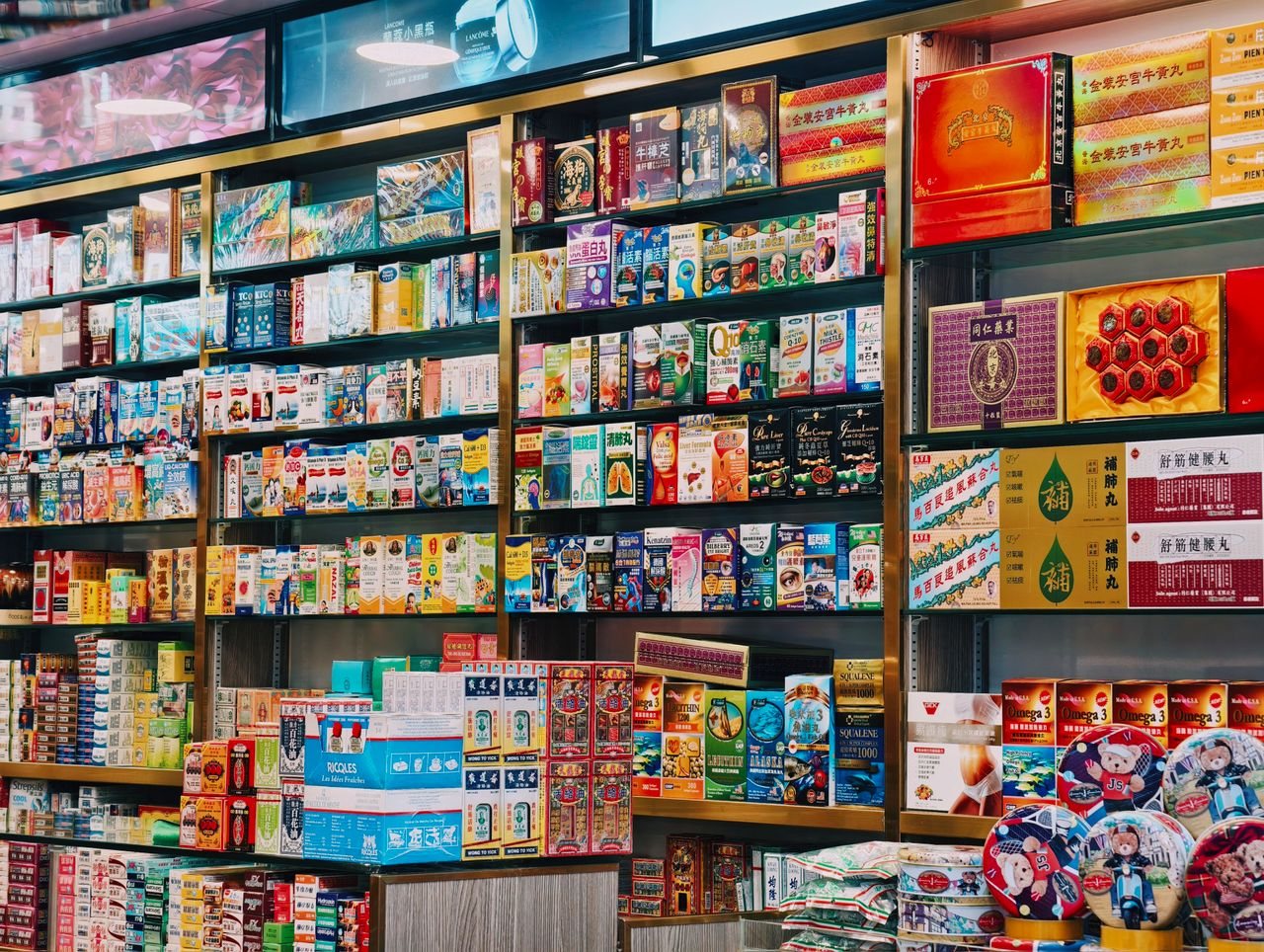 Free Bright and colorful display of various Asian products on supermarket shelves. Stock Photo